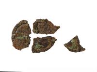 鉄地金銅張楕円形鏡板残欠